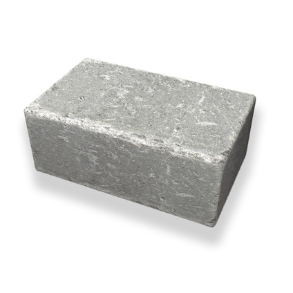 Rektangulär grå sten med en något oregelbunden yta.
