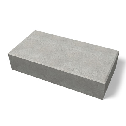 Rektangulär grå betongblock med en slät yta.
