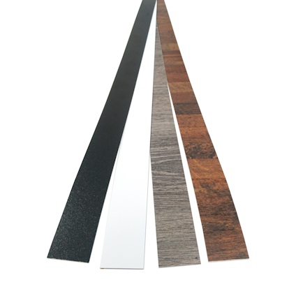 Fyra smala remsor i olika färger: svart, vitt, träliknande grått, och brunt träliknande mönster.